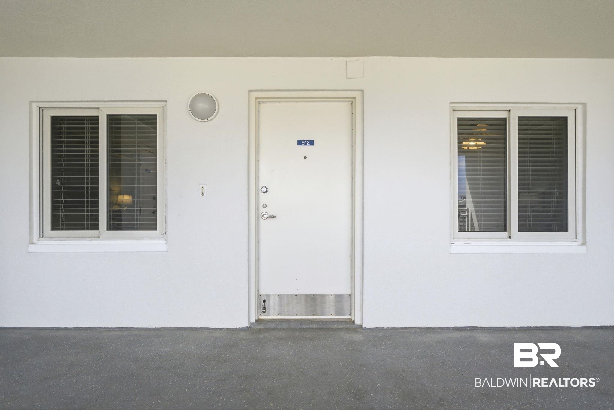 16284 Perdido Key Drive, Unit 912 Perdido Key, FL 32507 - Photo 7 of 49 Property entrance with stucco siding