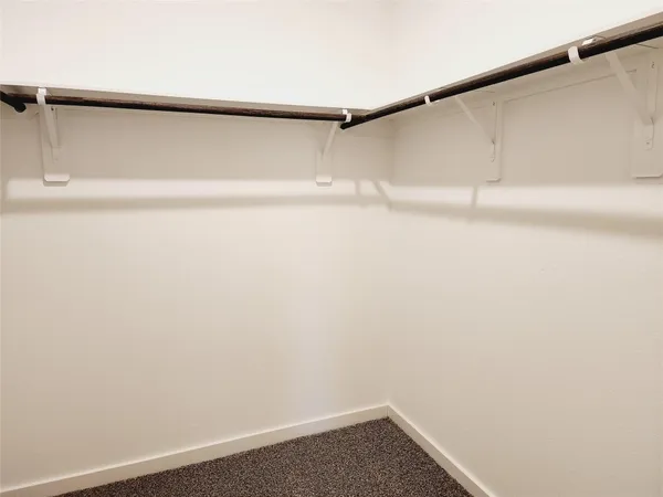 a view of small space with racks on the wall