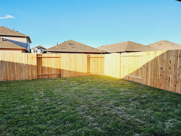a view of an house with backyard and outdoor space