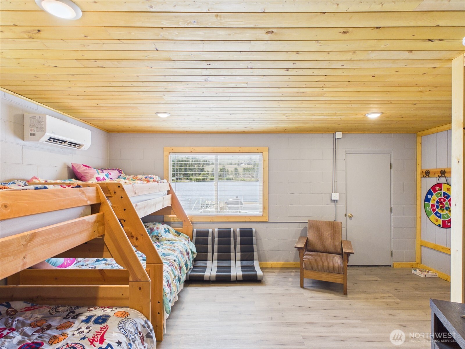 6 Marions Cove Road Republic, WA 99166 - Photo 13 of 33 a bed room with a bed and a window