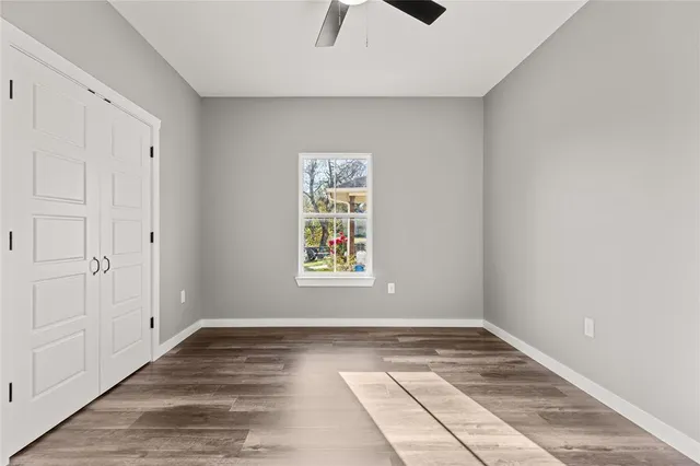 a view of an empty room and window