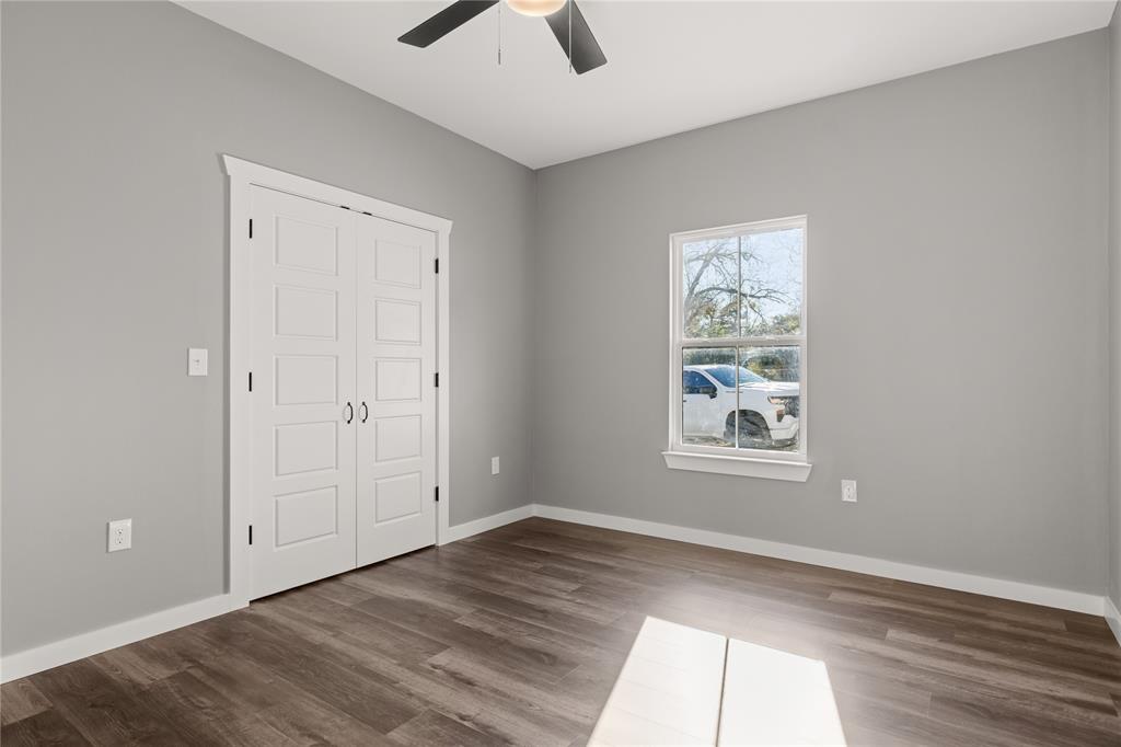 2020 Bosque Boulevard Waco, TX 76707 - Photo 16 of 27 an empty room with windows and closet