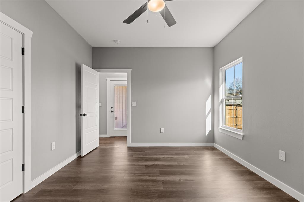2020 Bosque Boulevard Waco, TX 76707 - Photo 19 of 27 a view of an empty room with wooden floor and a window