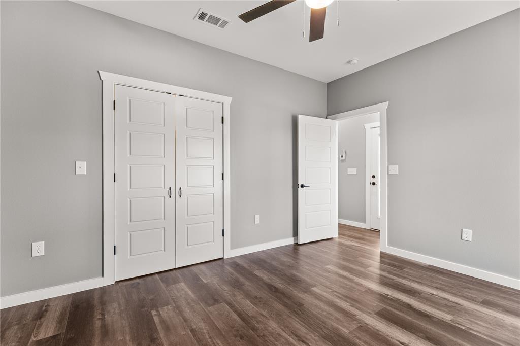 2020 Bosque Boulevard Waco, TX 76707 - Photo 20 of 27 a view of an empty room with window and chandelier fan