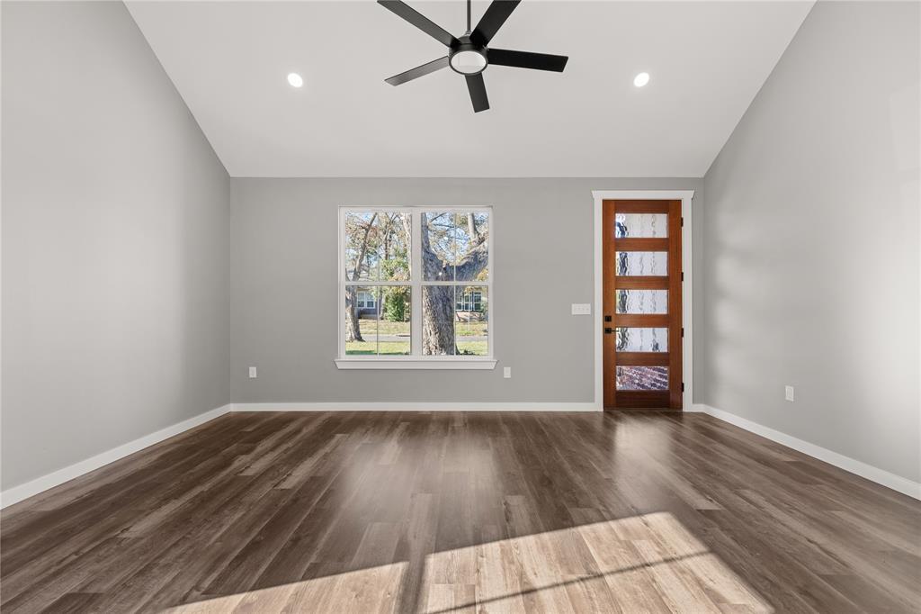 2020 Bosque Boulevard Waco, TX 76707 - Photo 5 of 27 wooden floor in an empty room with a window