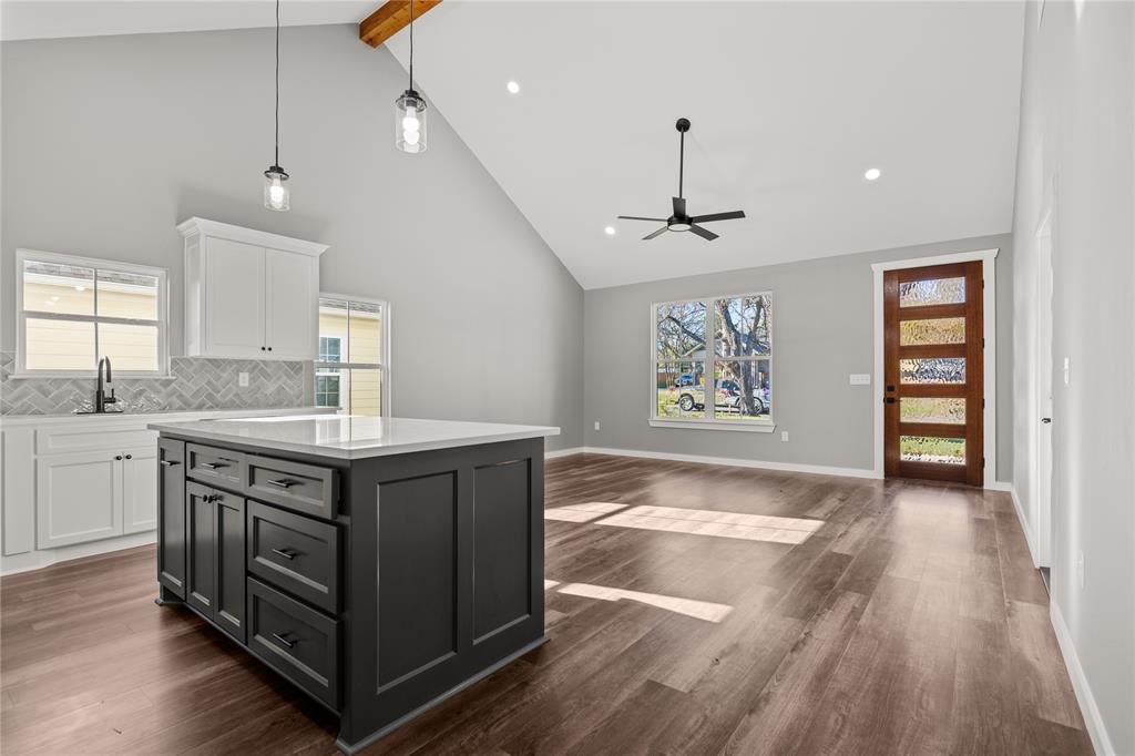 2020 Bosque Boulevard Waco, TX 76707 - Photo 6 of 27 a kitchen with stainless steel appliances granite countertop a stove a sink and a refrigerator