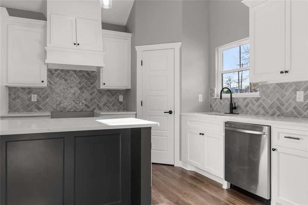 2020 Bosque Boulevard Waco, TX 76707 - Photo 9 of 27 a kitchen with stainless steel appliances granite countertop a sink stove and refrigerator