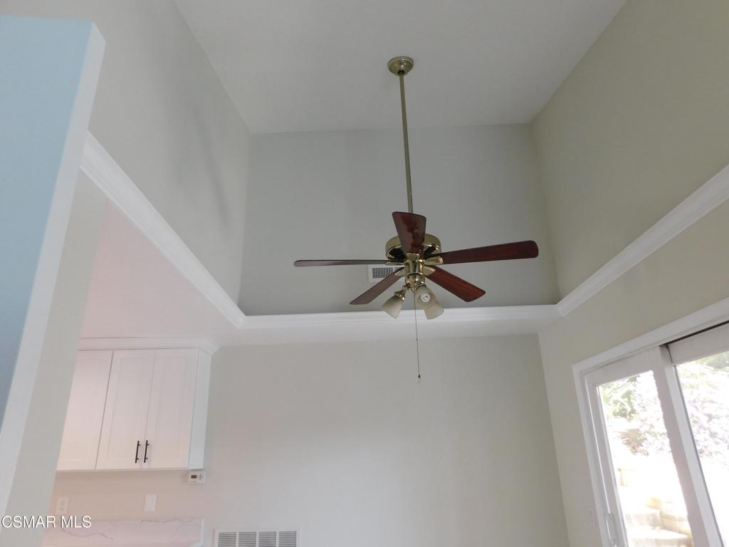 559 Stoney Peak Court Simi Valley, CA 93065 - Photo 20 of 62 a view of a room with a window and a ceiling fan