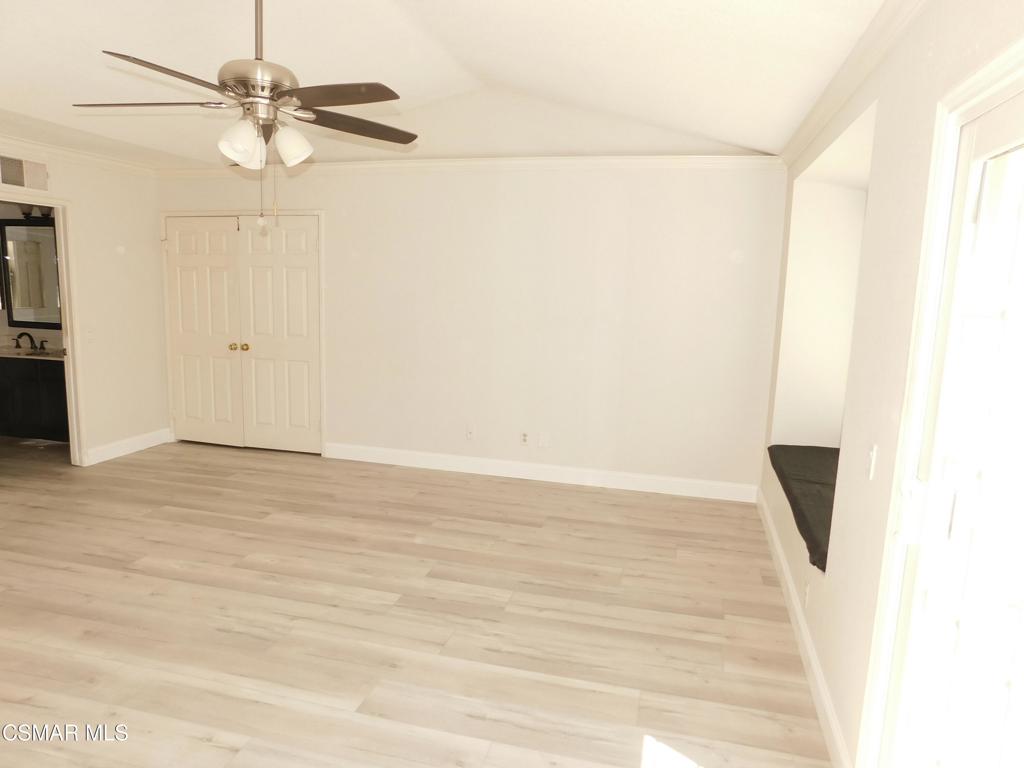 559 Stoney Peak Court Simi Valley, CA 93065 - Photo 29 of 62 a view of an empty room with a ceiling fan