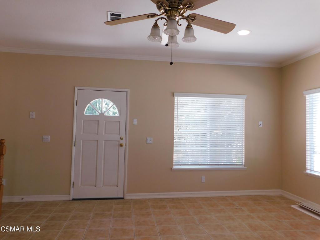 559 Stoney Peak Court Simi Valley, CA 93065 - Photo 48 of 62 a view of an empty room with a window