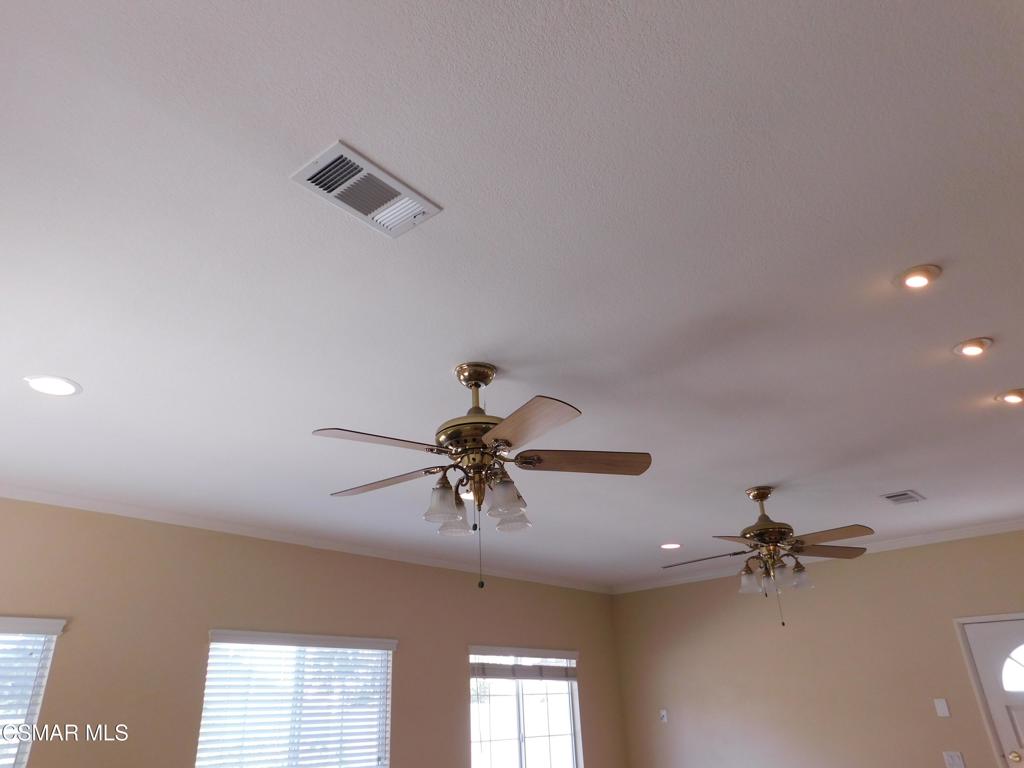 559 Stoney Peak Court Simi Valley, CA 93065 - Photo 50 of 62 a view of a chandelier fan and windows