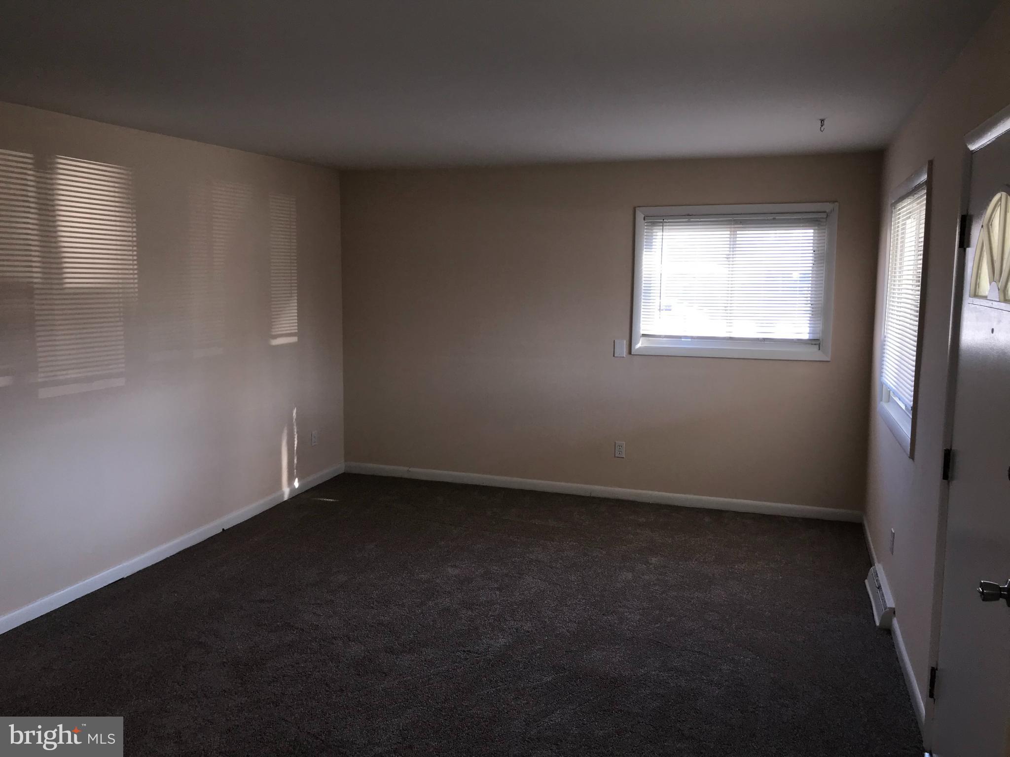 6200 Auth Road Suitland, MD 20746 - Photo 6 of 49 Living room, new paint & Carpet
