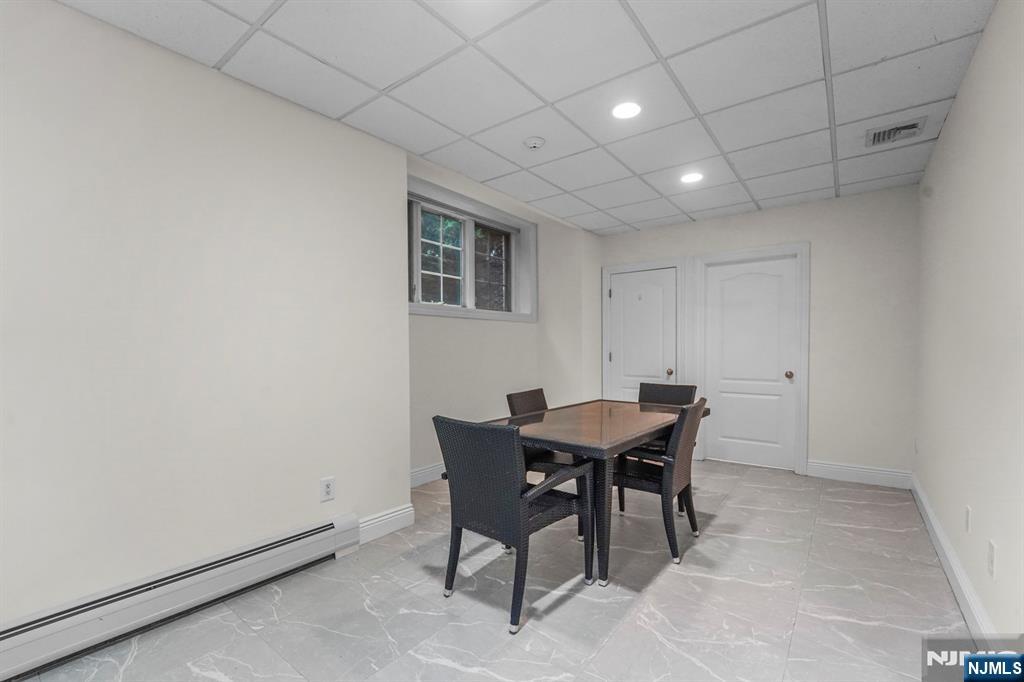 1 Euclid Road Fort Lee, NJ 07024 - Photo 39 of 50 a view of a dining room with furniture