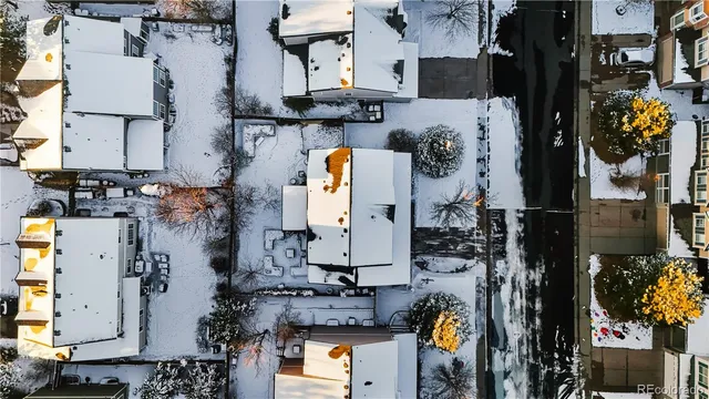 an aerial view of multi story residential apartment building with yard