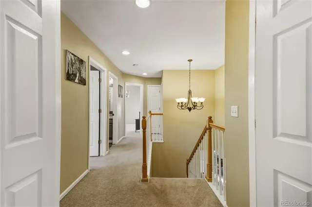 a view of a hallway with walk in closet