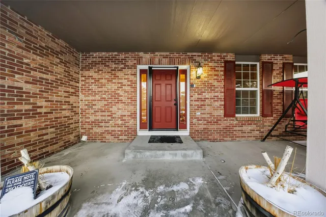 an aerial view of a city with lots of residential buildings