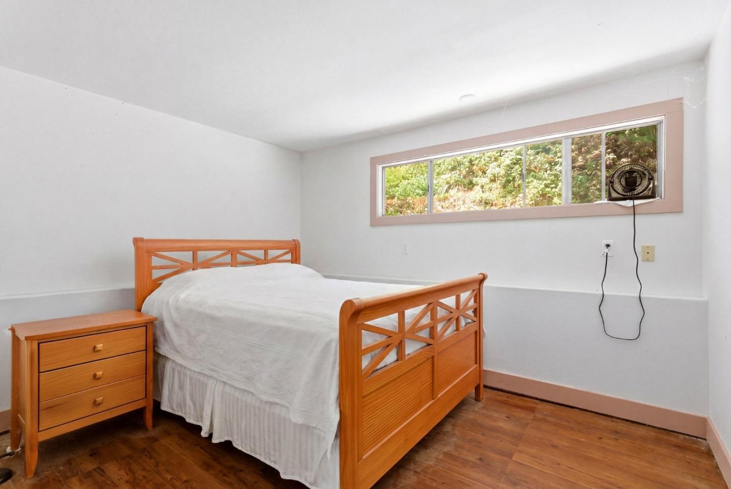 1460 Tucker Road Scotts Valley, CA 95066 - Photo 9 of 32 a bed room with a bed and a window