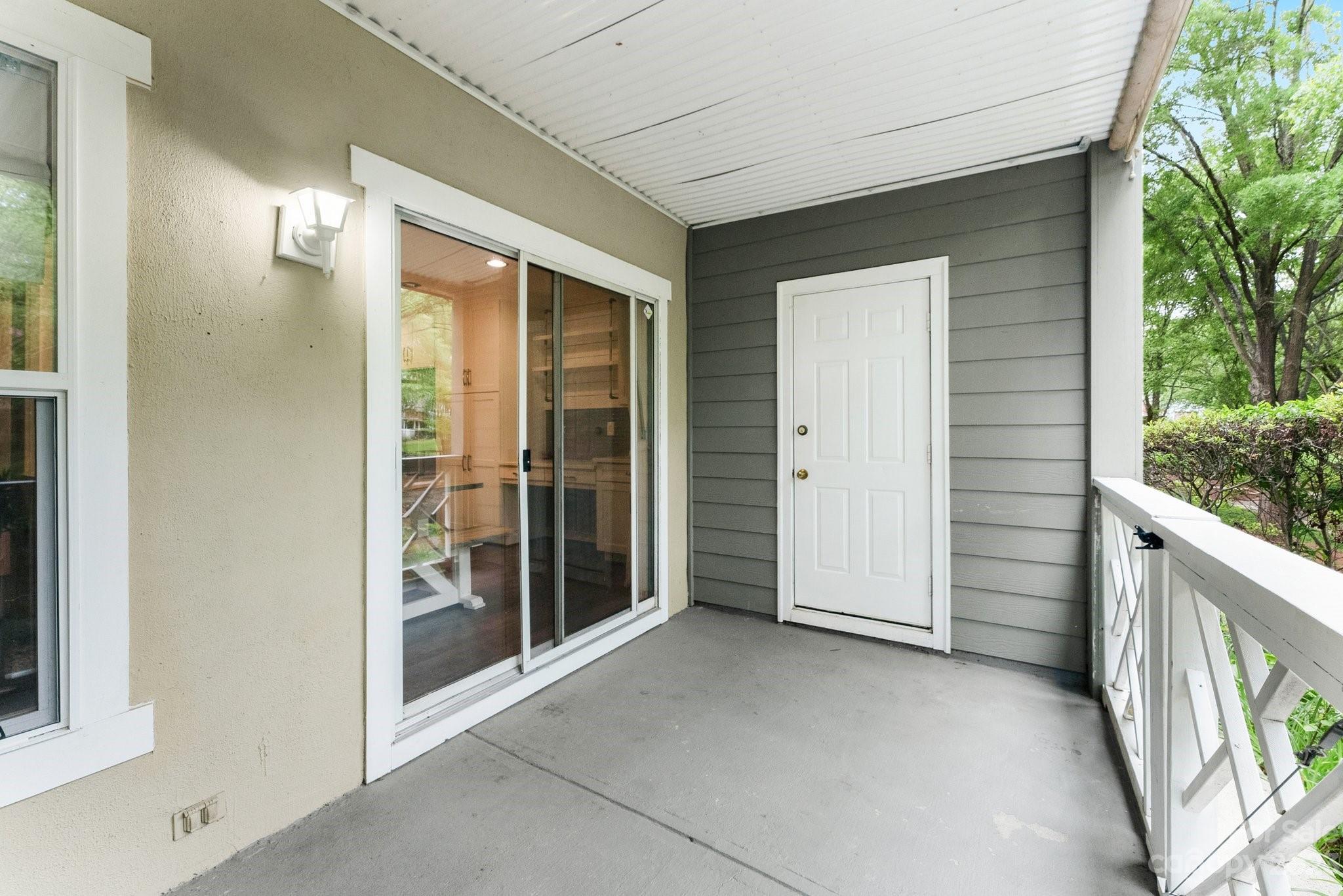 19905 Henderson Road, Unit A Cornelius, NC 28031 - Photo 30 of 46 a view of front door of house
