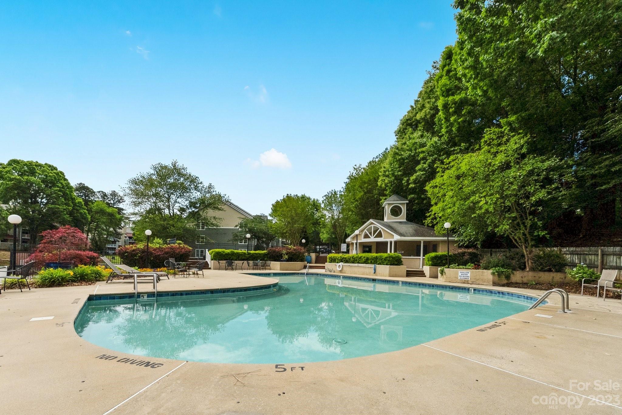 19905 Henderson Road, Unit A Cornelius, NC 28031 - Photo 36 of 46 an aerial view of a house with swimming pool garden and patio