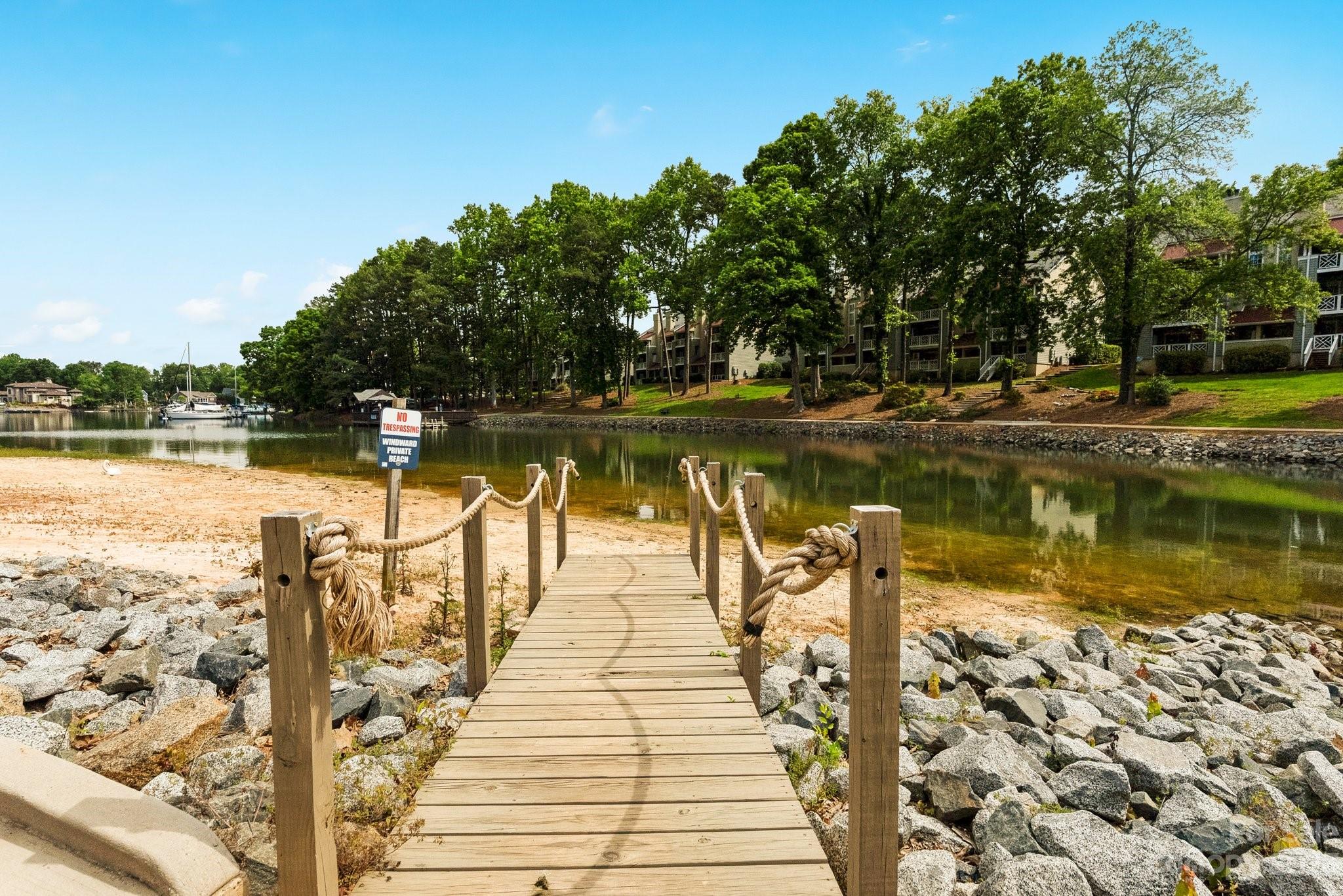 19905 Henderson Road, Unit A Cornelius, NC 28031 - Photo 39 of 46 a view of a lake with trees