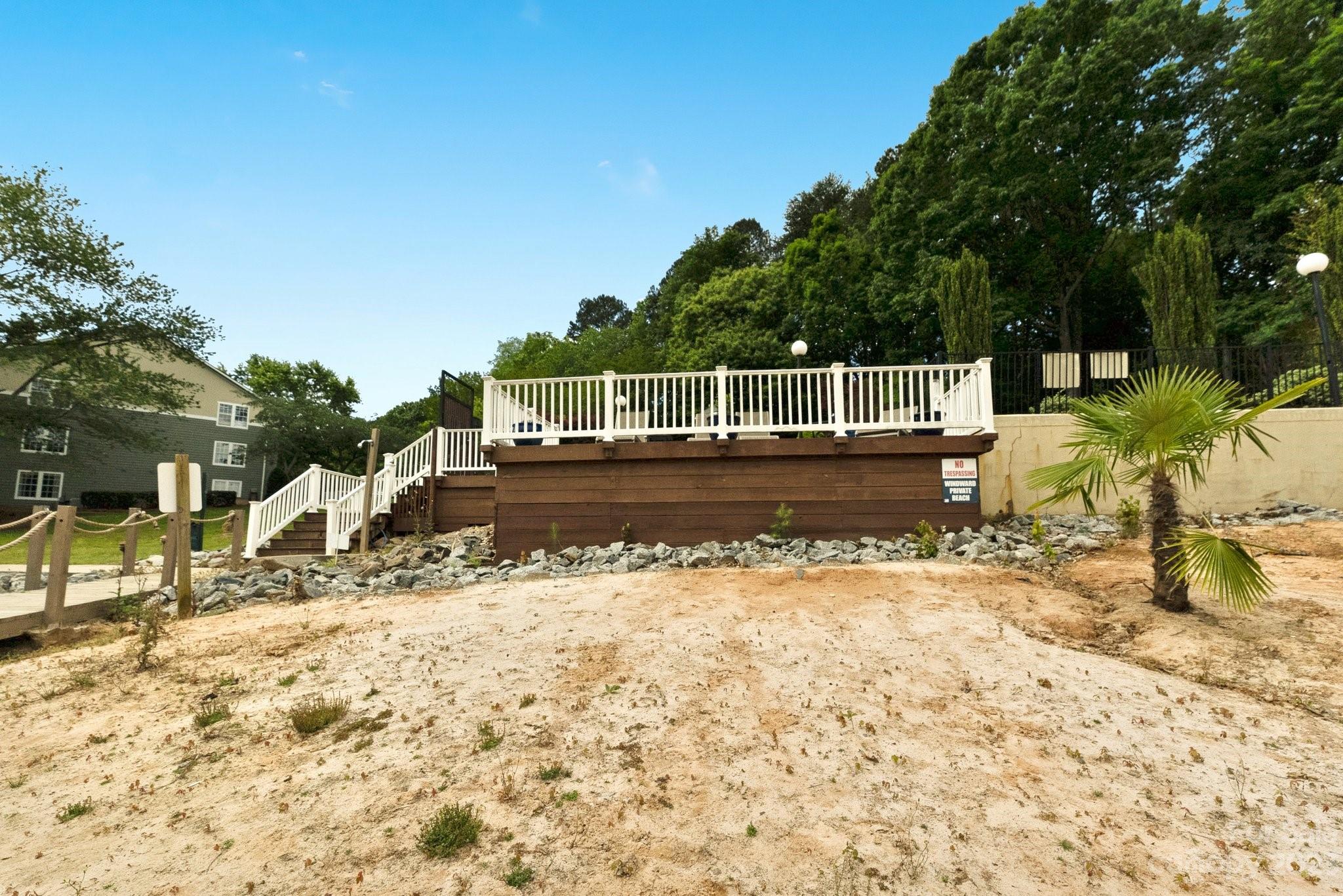 19905 Henderson Road, Unit A Cornelius, NC 28031 - Photo 45 of 46 a view of a house with a yard