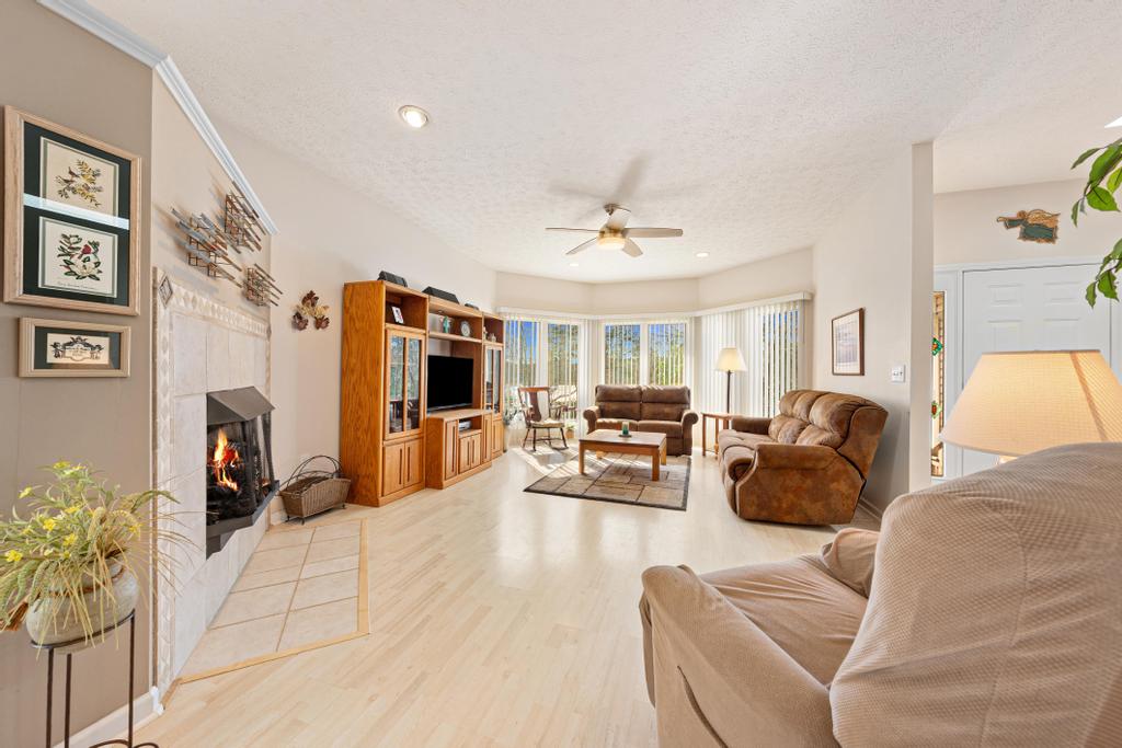 109 Sheldon Lane Westminster, SC 29693 - Photo 7 of 39 This inviting living room features a cozy fireplace and abundant natural light.