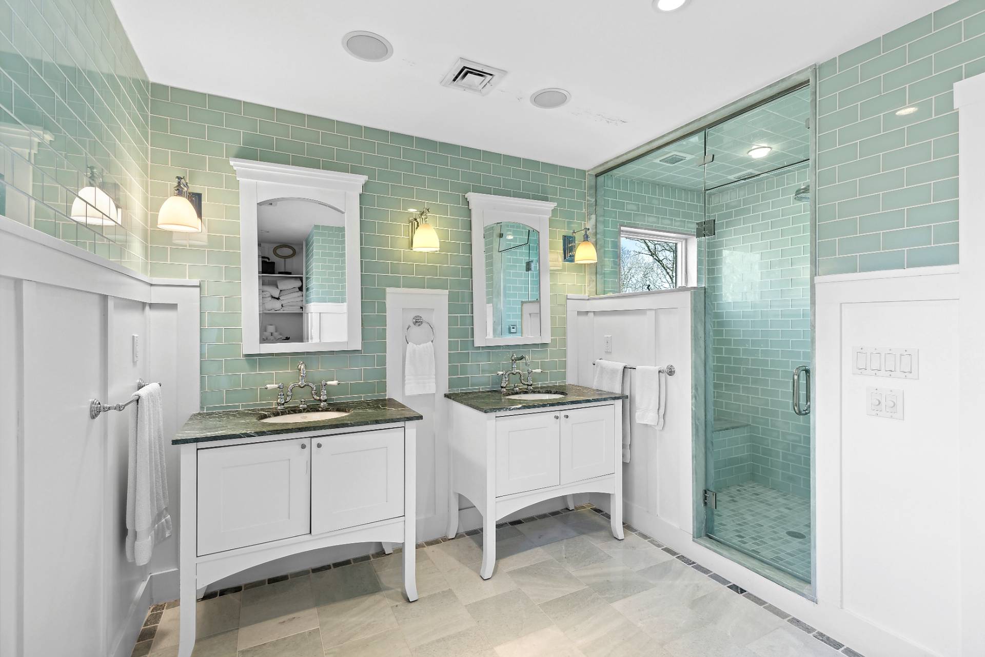 23 Sycamore Lane Montauk, NY 11954 - Photo 11 of 33 a bathroom with a sink a mirror and a shower
