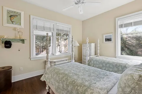 a bathroom with a sink toilet tub and shower