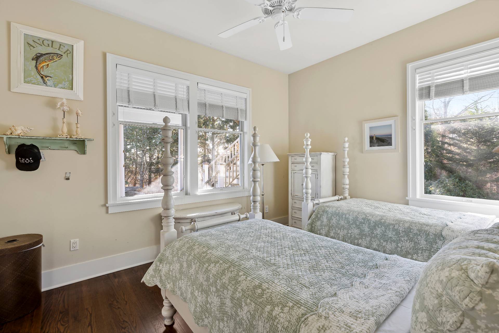 23 Sycamore Lane Montauk, NY 11954 - Photo 14 of 33 a bed sitting in a bedroom next to a window
