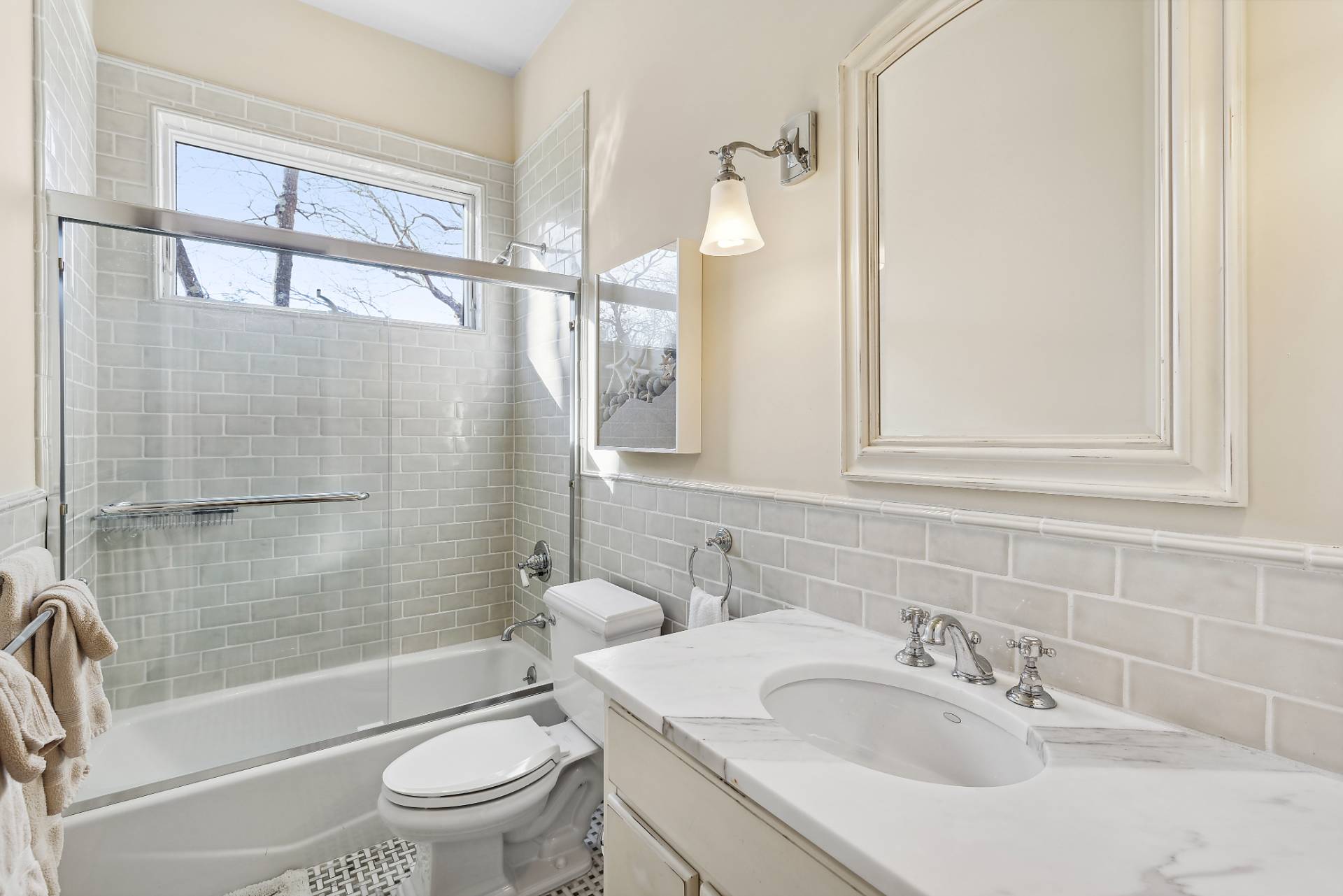 23 Sycamore Lane Montauk, NY 11954 - Photo 15 of 33 a bathroom with a sink toilet tub and shower