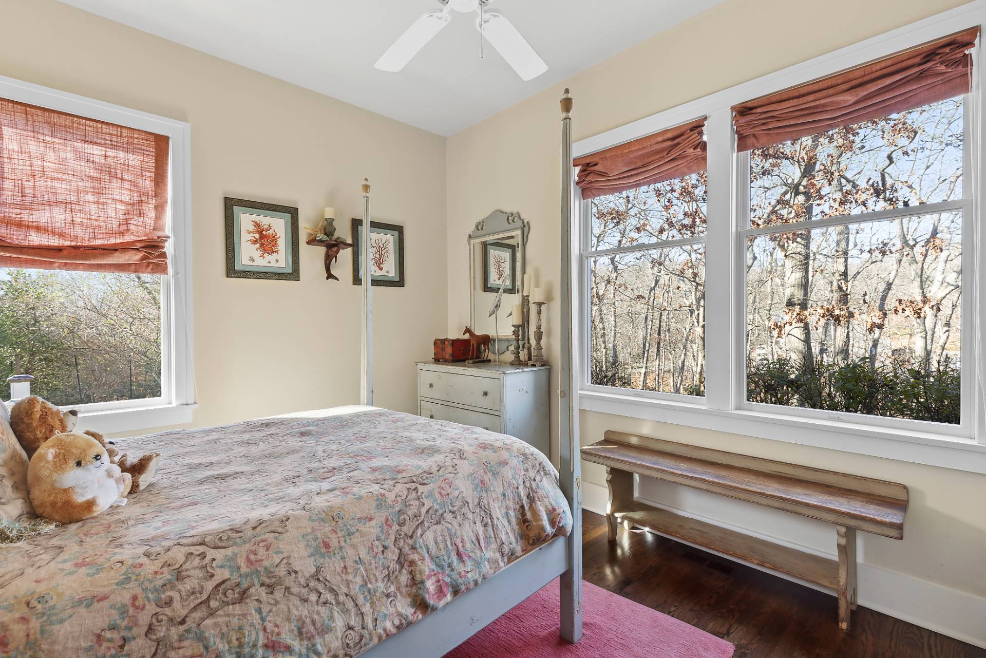 23 Sycamore Lane Montauk, NY 11954 - Photo 16 of 33 a bedroom with a bed and a large window with the outer view