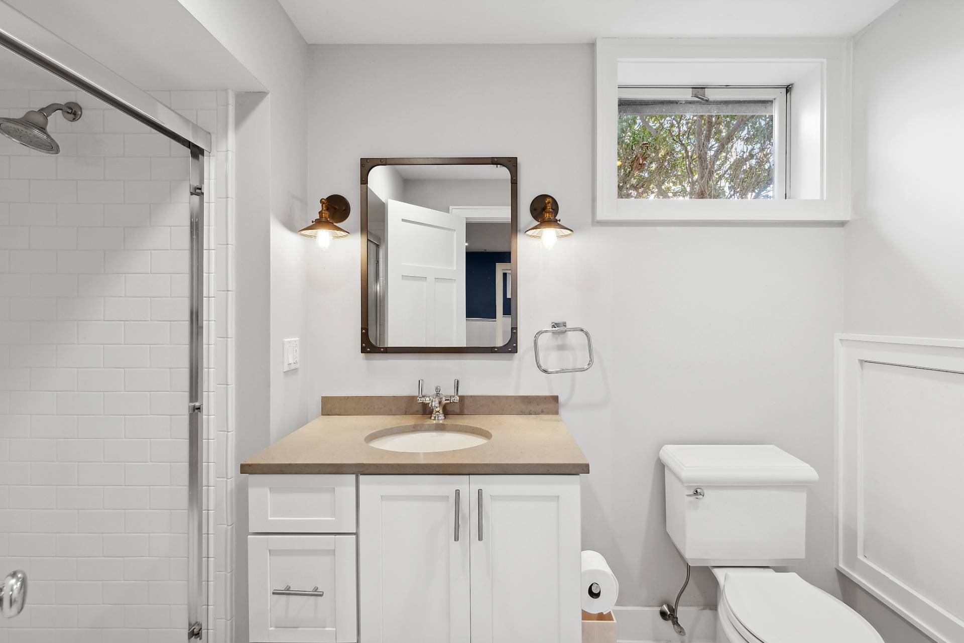 23 Sycamore Lane Montauk, NY 11954 - Photo 22 of 33 a bathroom with a toilet a sink a vanity and mirror