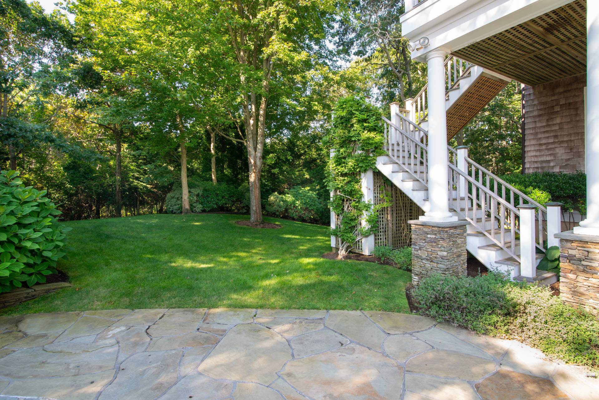 23 Sycamore Lane Montauk, NY 11954 - Photo 29 of 33 a view of a house with a yard