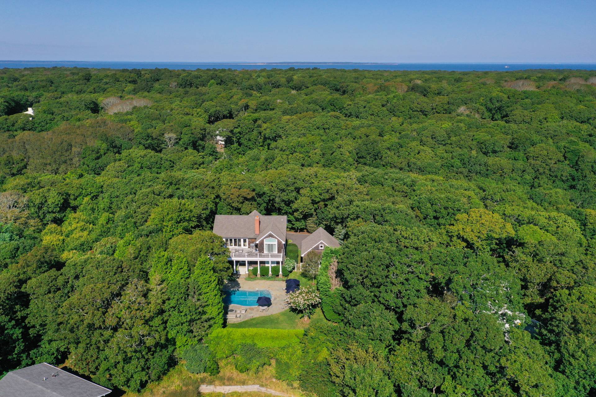 23 Sycamore Lane Montauk, NY 11954 - Photo 30 of 33 a view of a yard with a sink