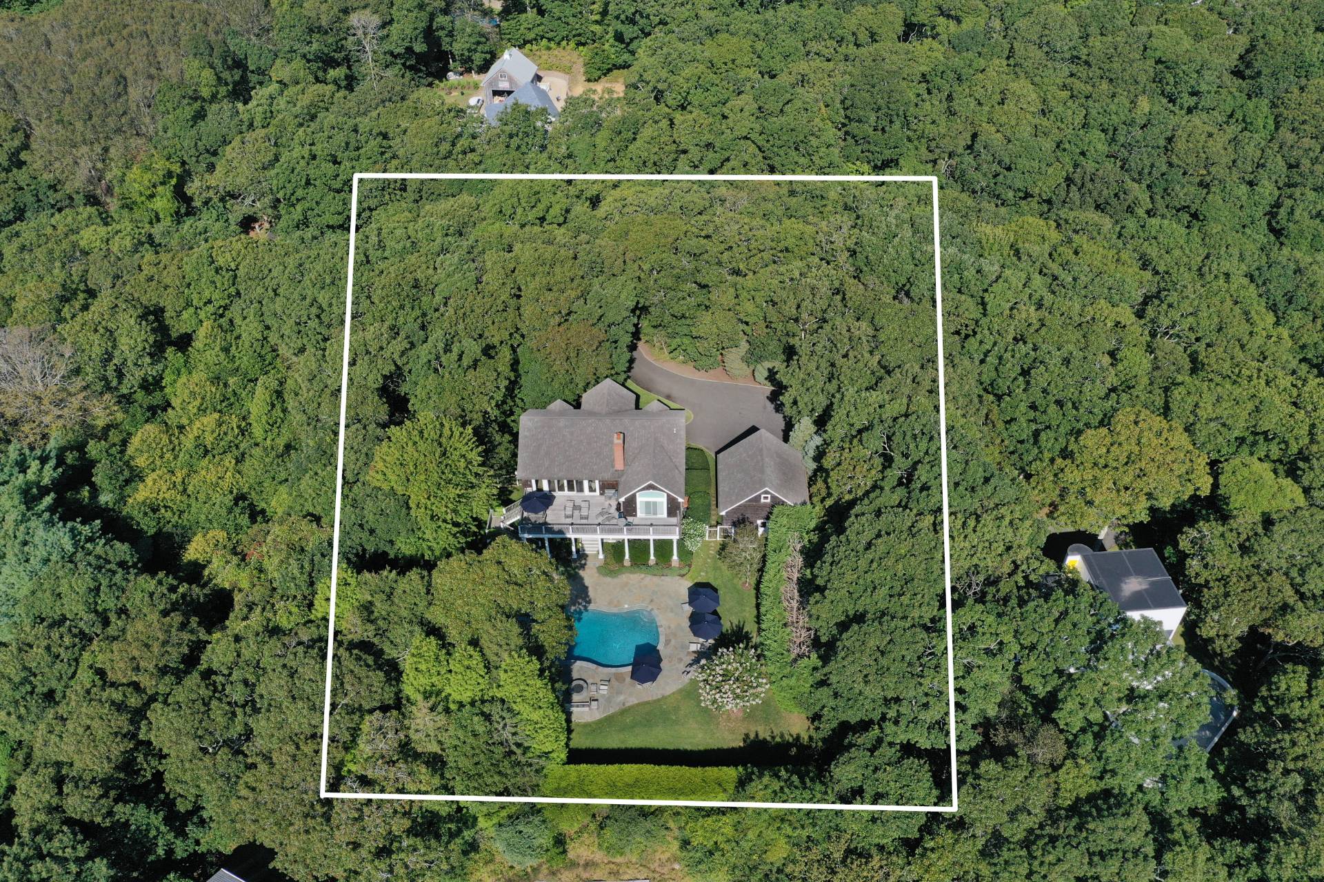 23 Sycamore Lane Montauk, NY 11954 - Photo 31 of 33 an aerial view of a house with a yard