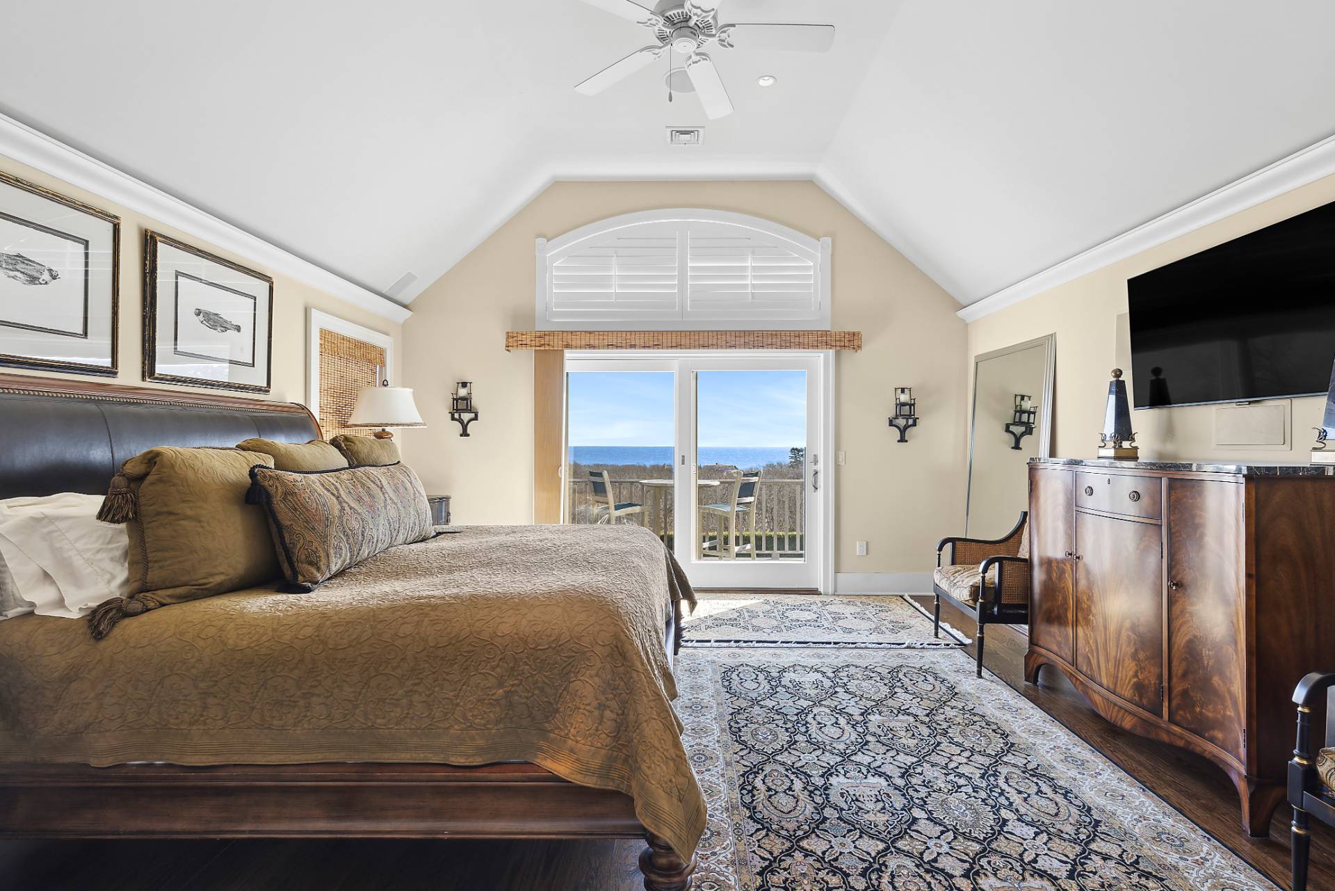 23 Sycamore Lane Montauk, NY 11954 - Photo 10 of 33 a living room with a bed furniture and a large window