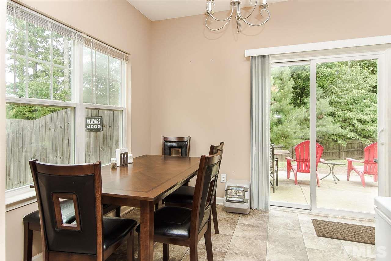 616 Smith Ridge Way Fuquay-Varina, NC 27526 - Photo 11 of 21 Dining area opens up to back patio.