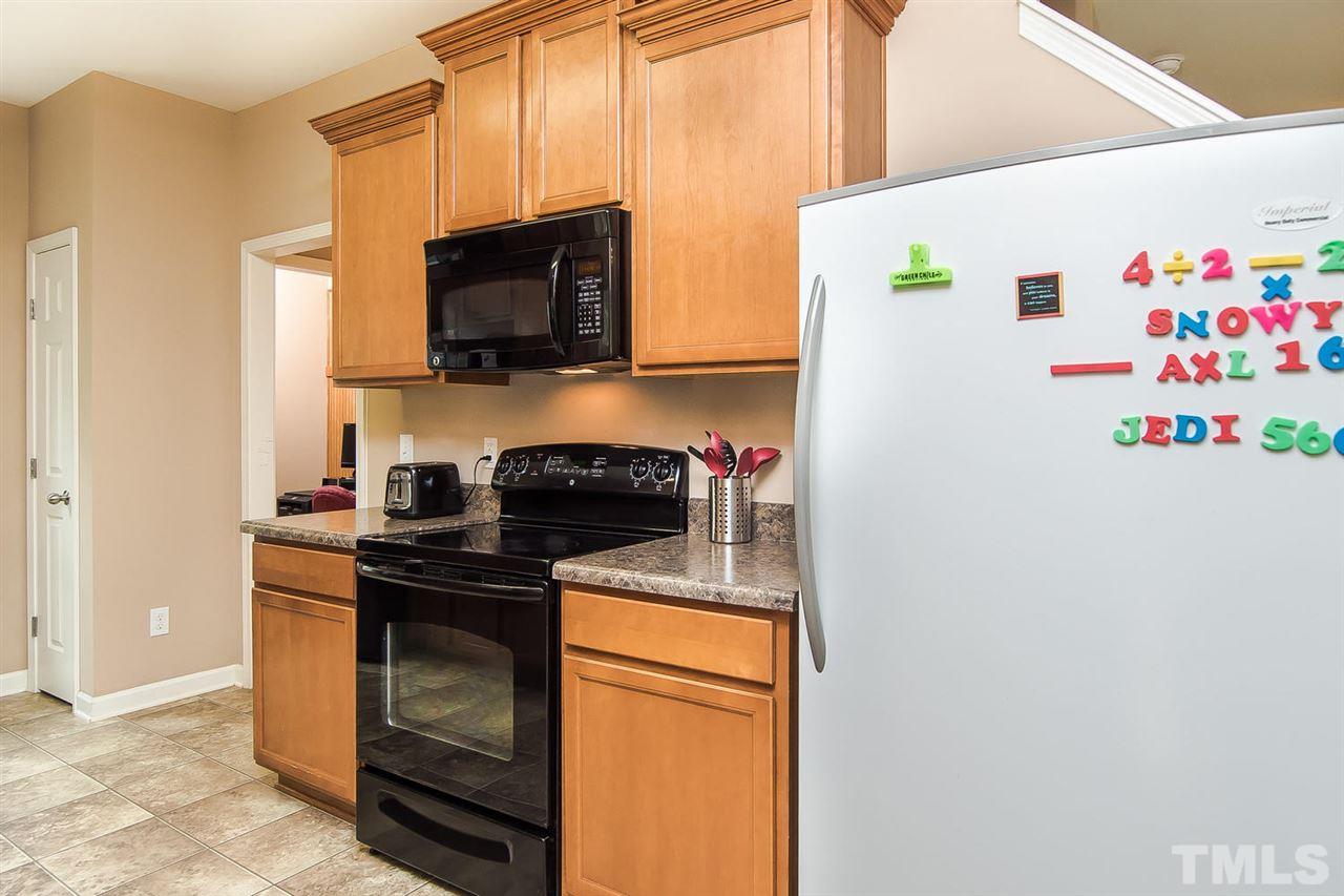 616 Smith Ridge Way Fuquay-Varina, NC 27526 - Photo 13 of 21 Only half of the kitchen pictured here, and there's tons of room to cook!