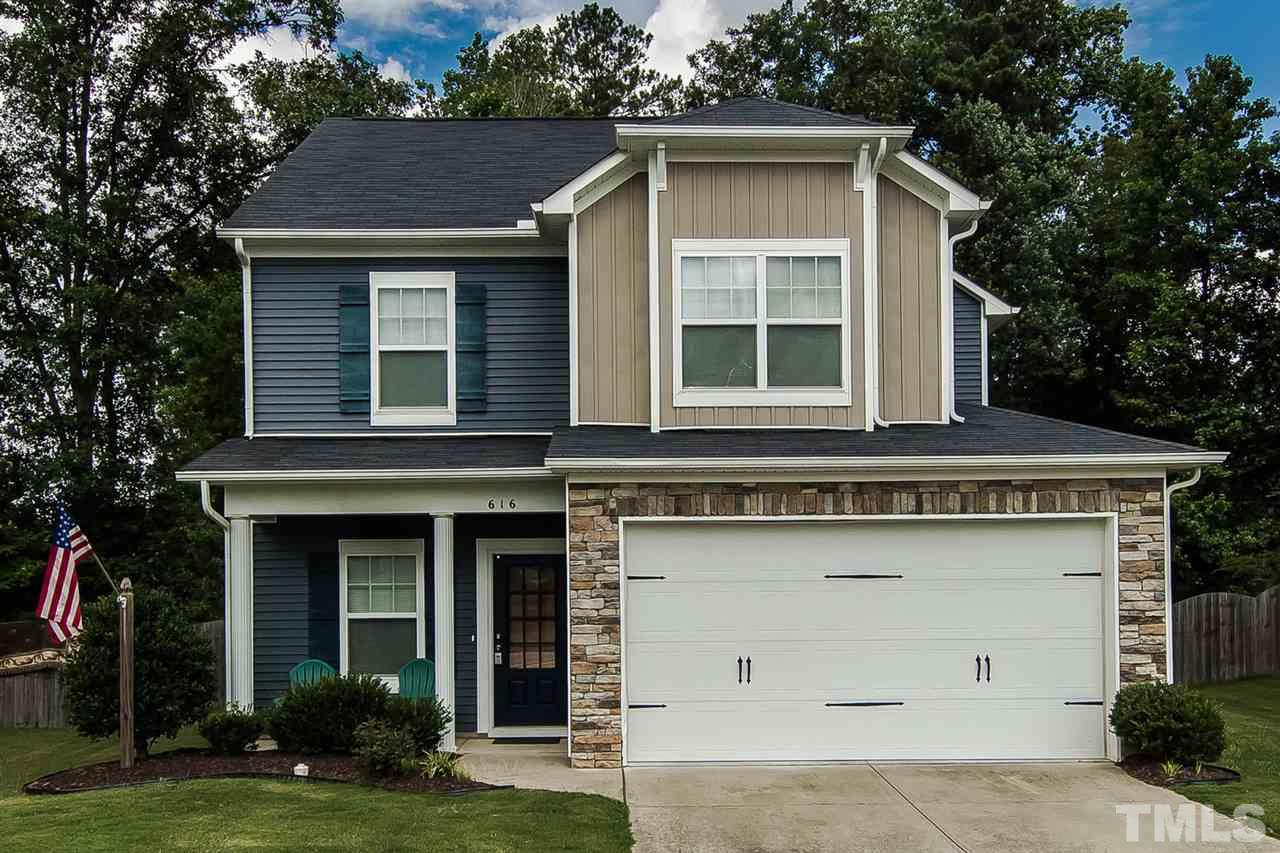 616 Smith Ridge Way Fuquay-Varina, NC 27526 - Photo 4 of 21 The Stevenson 2 plan, a well designed craftsman; which features a two-car garage.