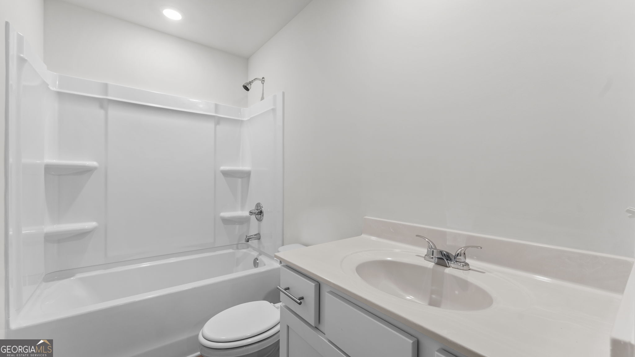 44 Umber Lane Newnan, GA 30263 - Photo 18 of 28 a bathroom with a sink toilet tub and shower