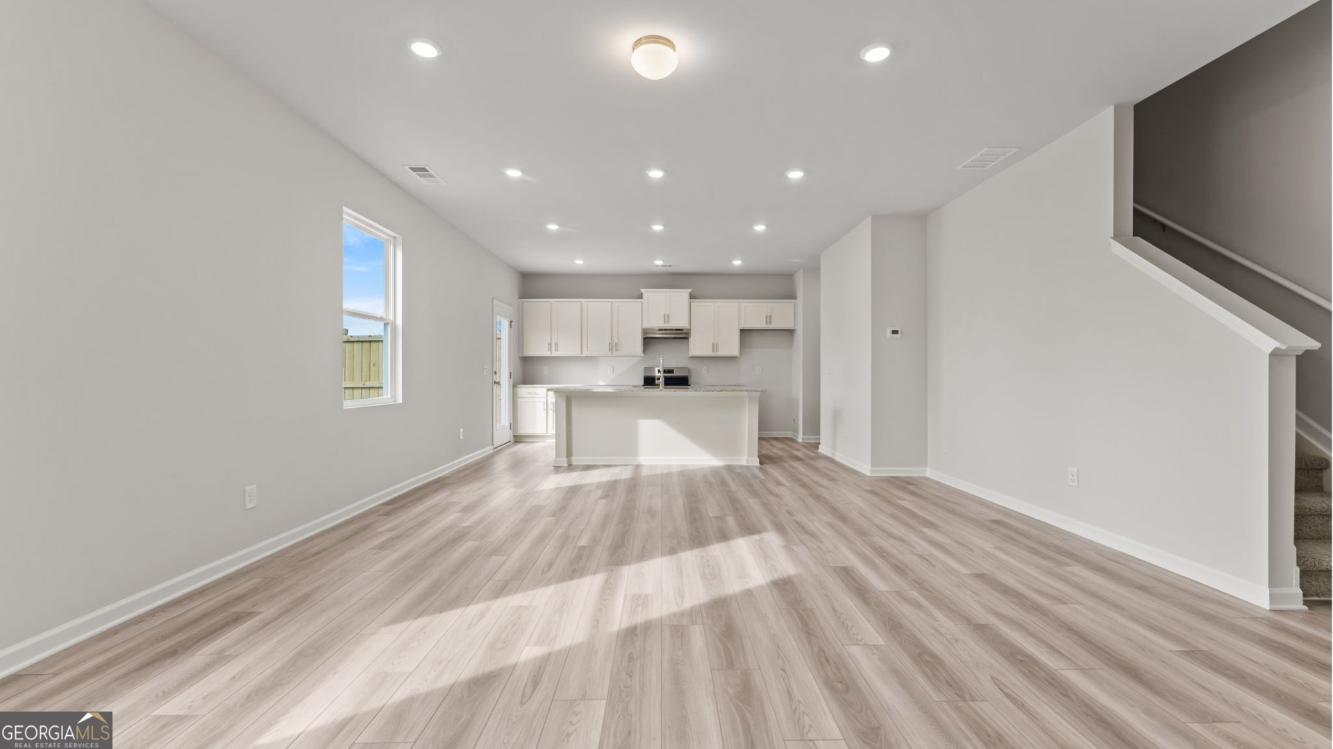 44 Umber Lane Newnan, GA 30263 - Photo 6 of 28 a view of a kitchen with wooden floor
