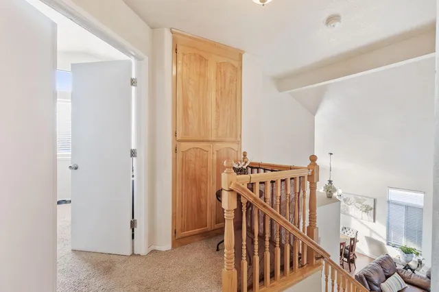 a view of a hallway with windows