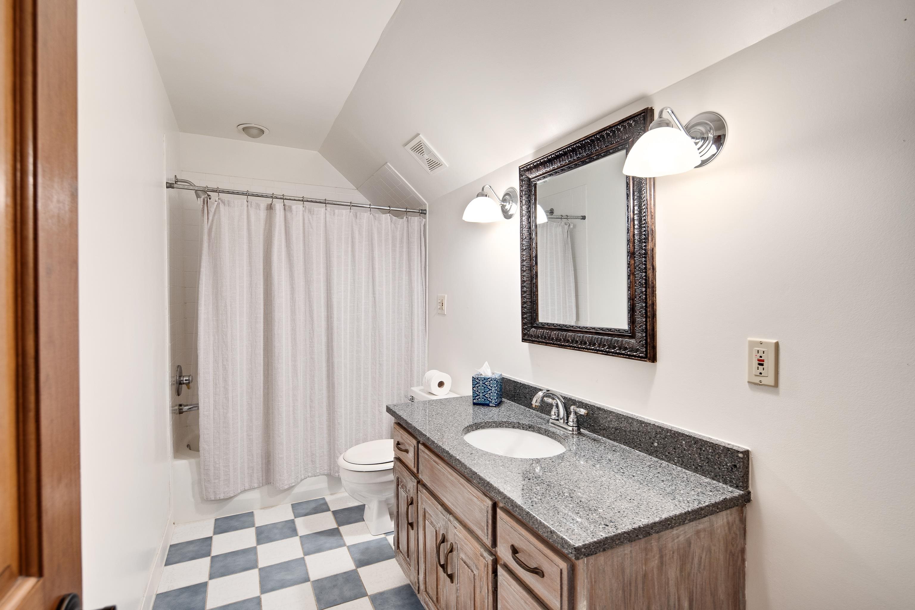 1172 North Reid Hooker Road Eads, TN 38028 - Photo 31 of 33 Full bathroom with vanity, toilet, vaulted ceiling, and shower / tub combo with curtain