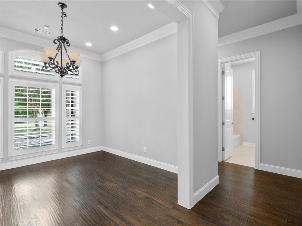 107 Marina Del Ray Bridgeport, TX 76426 - Photo 16 of 40 a view of an empty room with wooden floor and a window