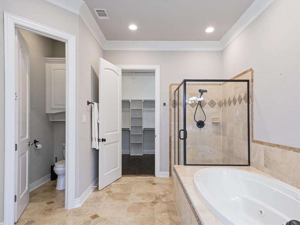 107 Marina Del Ray Bridgeport, TX 76426 - Photo 19 of 40 a bathroom with a bathtub and a shower