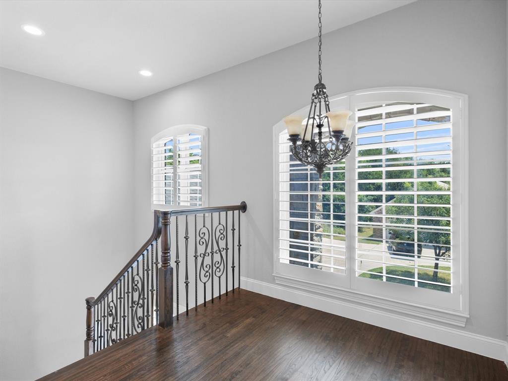 107 Marina Del Ray Bridgeport, TX 76426 - Photo 23 of 40 a view of empty room with wooden floor and fan