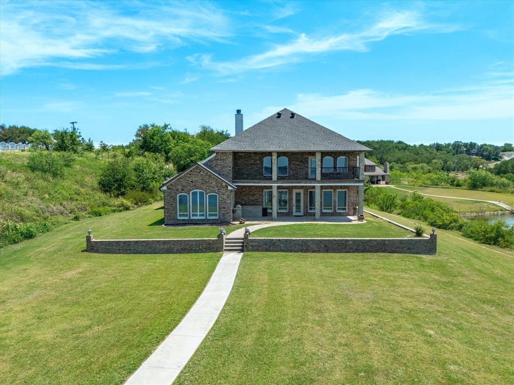 107 Marina Del Ray Bridgeport, TX 76426 - Photo 34 of 40 a view of a house with a big yard