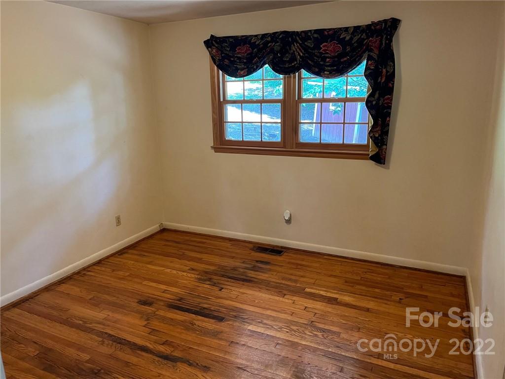 612 Mcdade Road Tryon, NC 28782 - Photo 11 of 27 a view of a window in an empty room