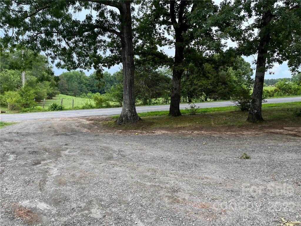 612 Mcdade Road Tryon, NC 28782 - Photo 17 of 27 a view of a yard with trees
