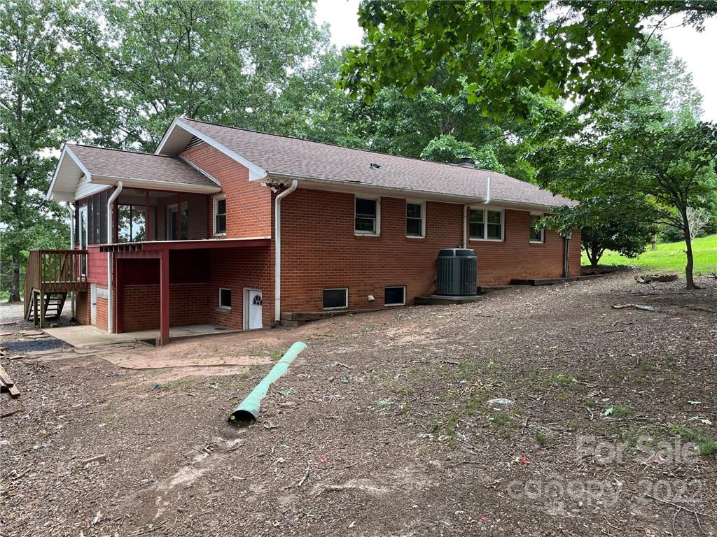 612 Mcdade Road Tryon, NC 28782 - Photo 2 of 27 a view of a house with a yard